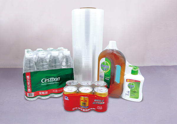 What are the characteristics of PVC heat shrinkable film commonly used in mineral water packaging?